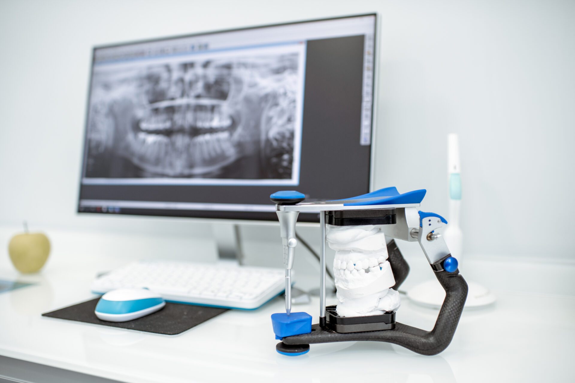 Working place with computer and artificial jaw in the dental office
